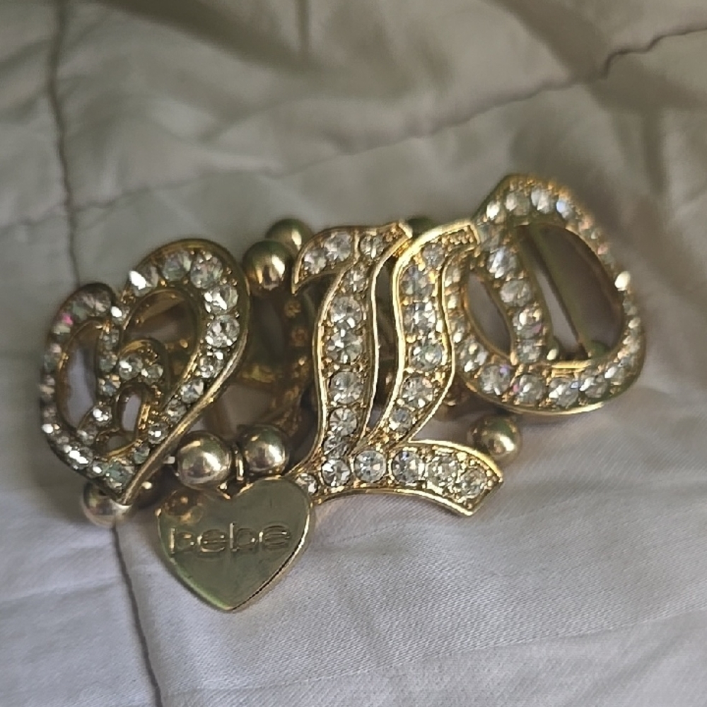 Bebe NWOT Gold Rhinestone Love Bracelet